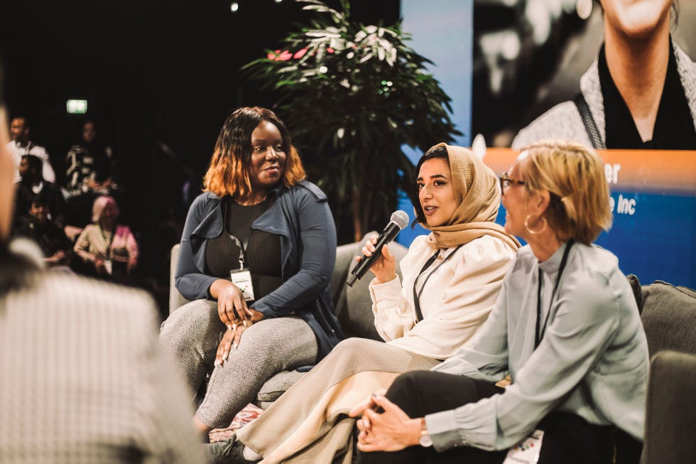 a group of people sitting on a couch