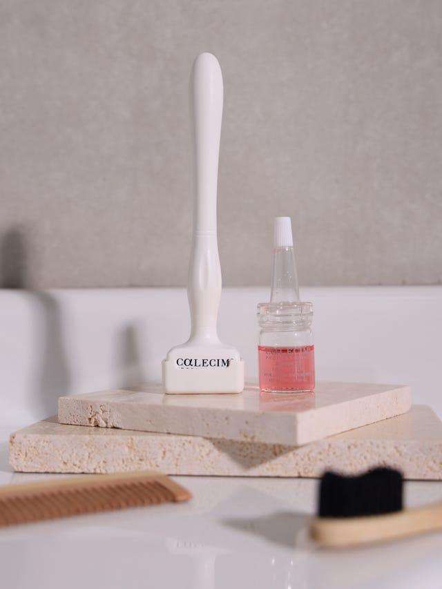 a bottle of nail polish on a counter