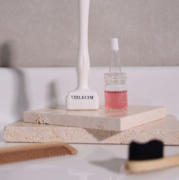 a bottle of nail polish on a counter