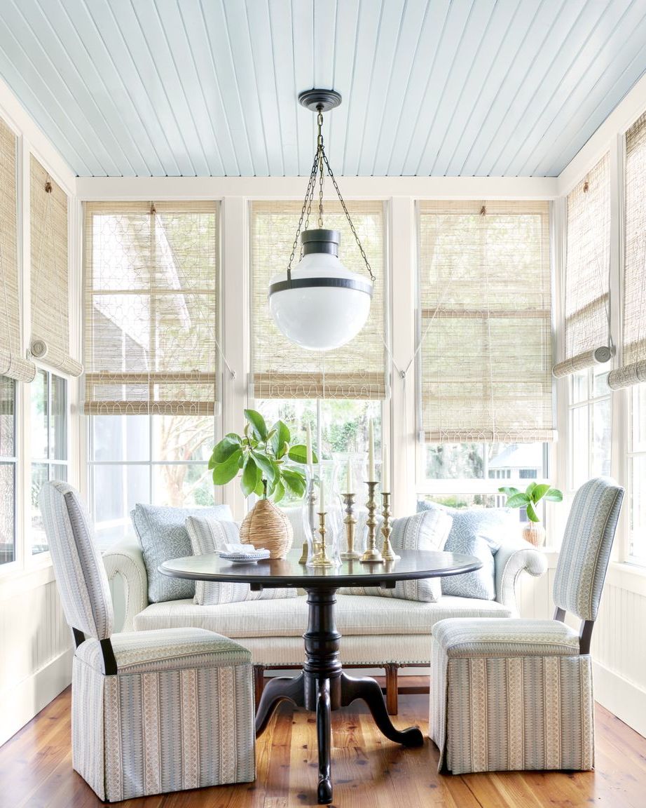 coastal dining room with blue ceiling