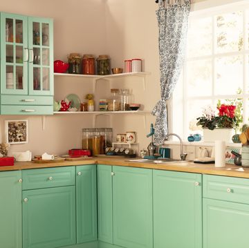 light green wooden kitchren with window