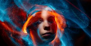 light-painting-portrait-close-up-of-young-woman-royalty-free-image-1742252122.pjpeg