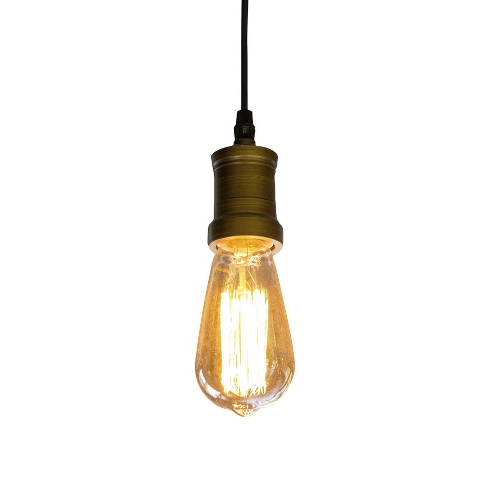 close up of illuminated light bulb against white background