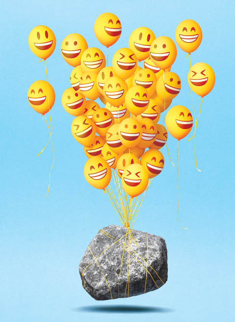 rock being lifted by smiling faces balloons