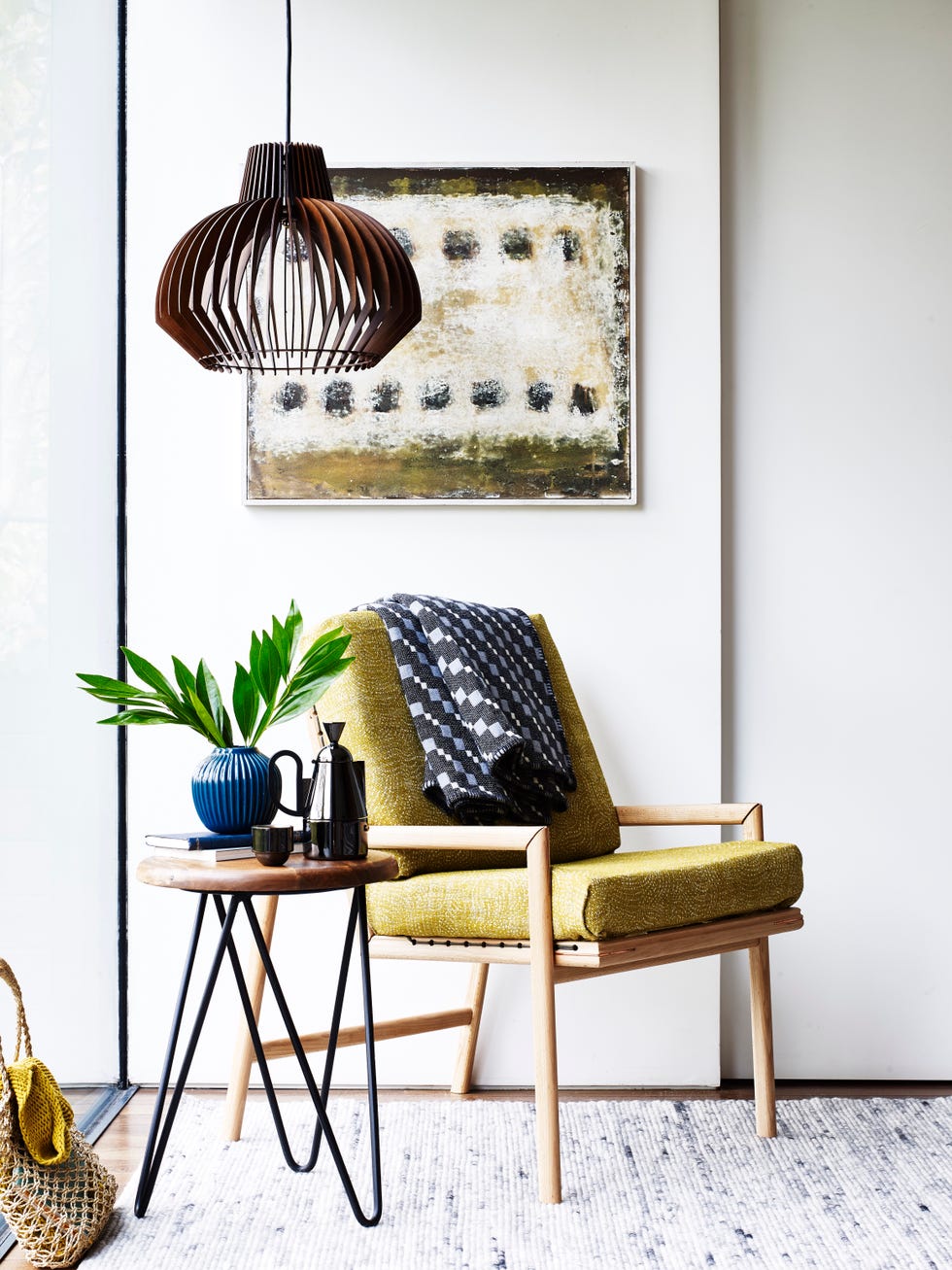 Chair with great light and accessories on the table.