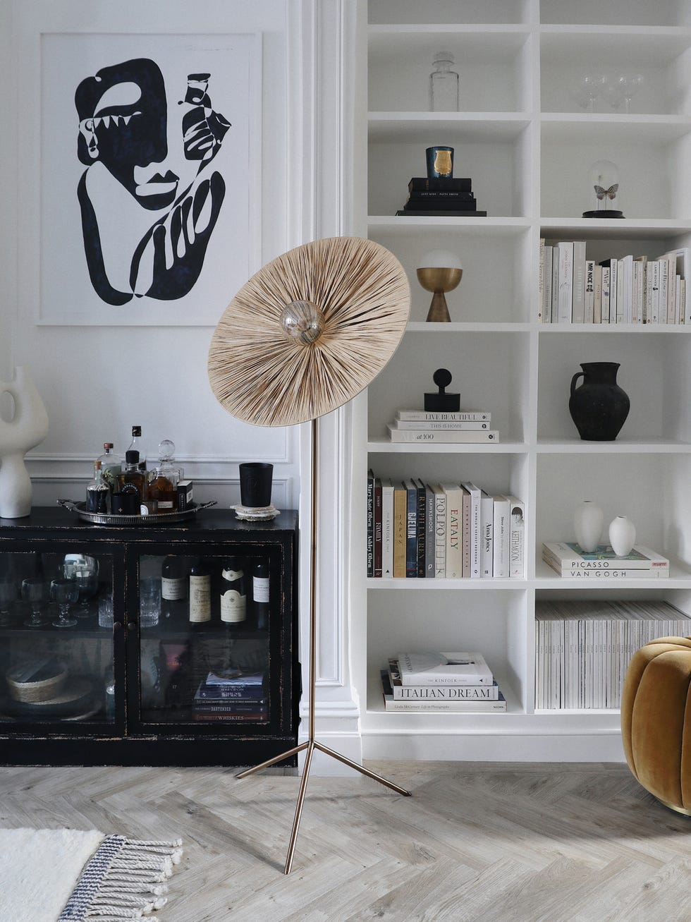 natural raffia and burnished brass floor lamp