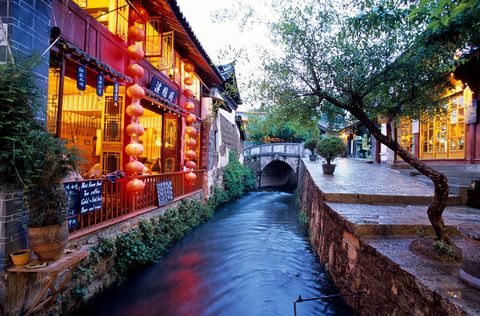 The old town of Lijiang in Yunnan Province sits high in the mountains with a complex ancient water system feeding canals and channels still in use today