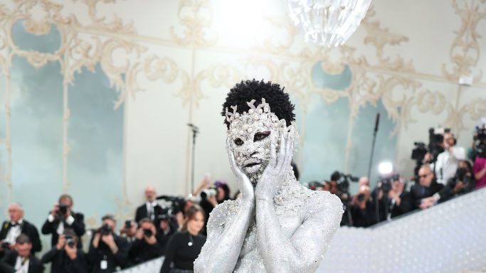 683px x 384px - Lil Nas X Wore Nothing But a Thong and Silver Body Paint at the 2023 Met  Gala