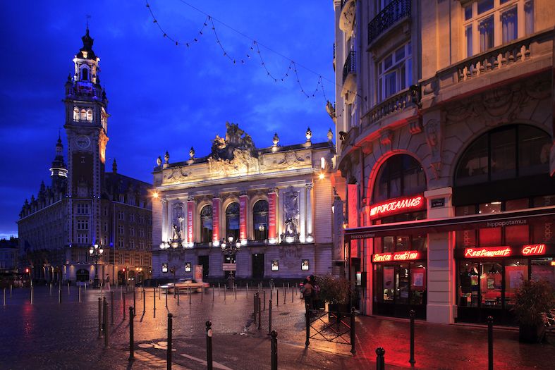 the night view of lille opera opera de lille and lille chamber of commerce building