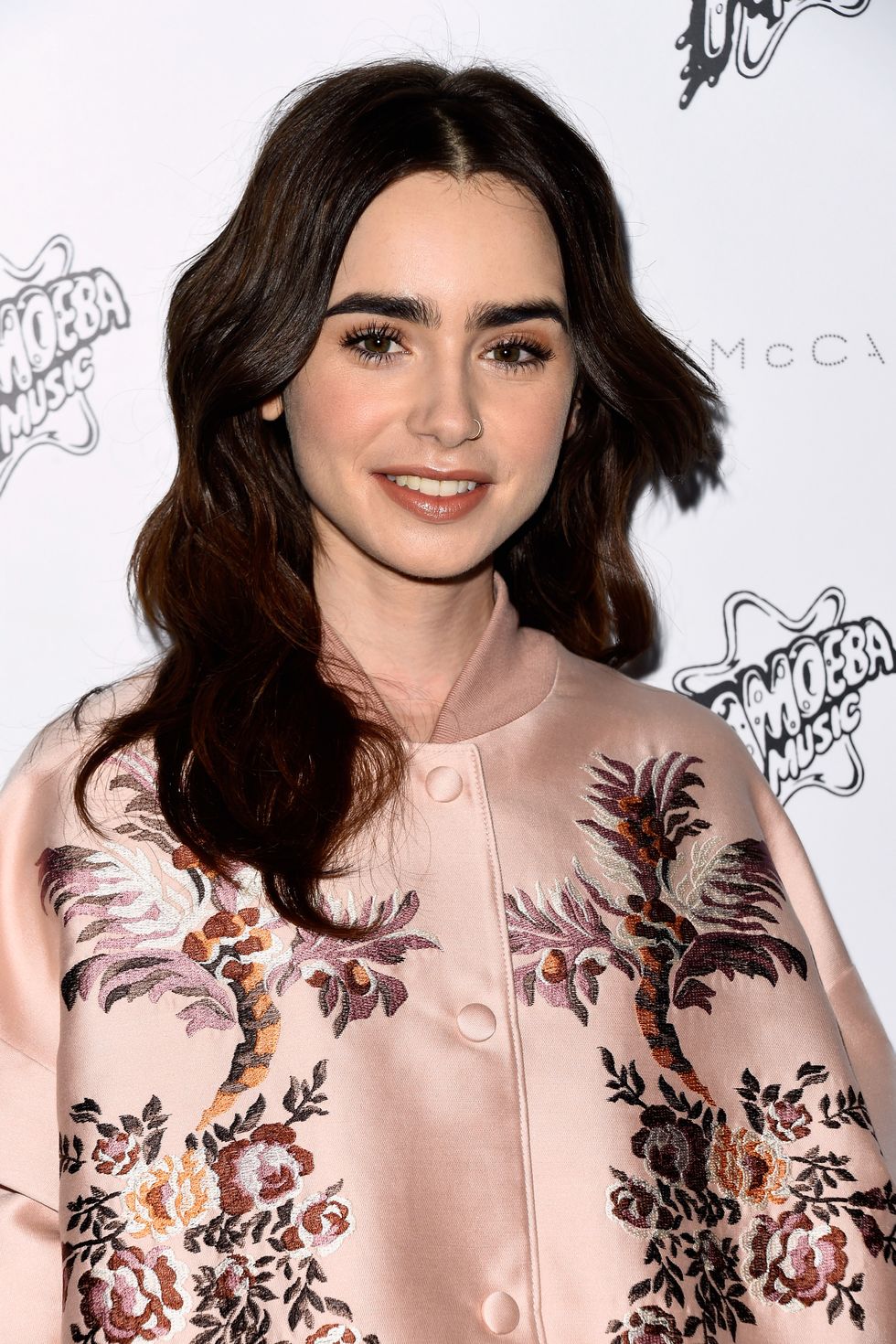 lily collins heart-shaped hairstyle
