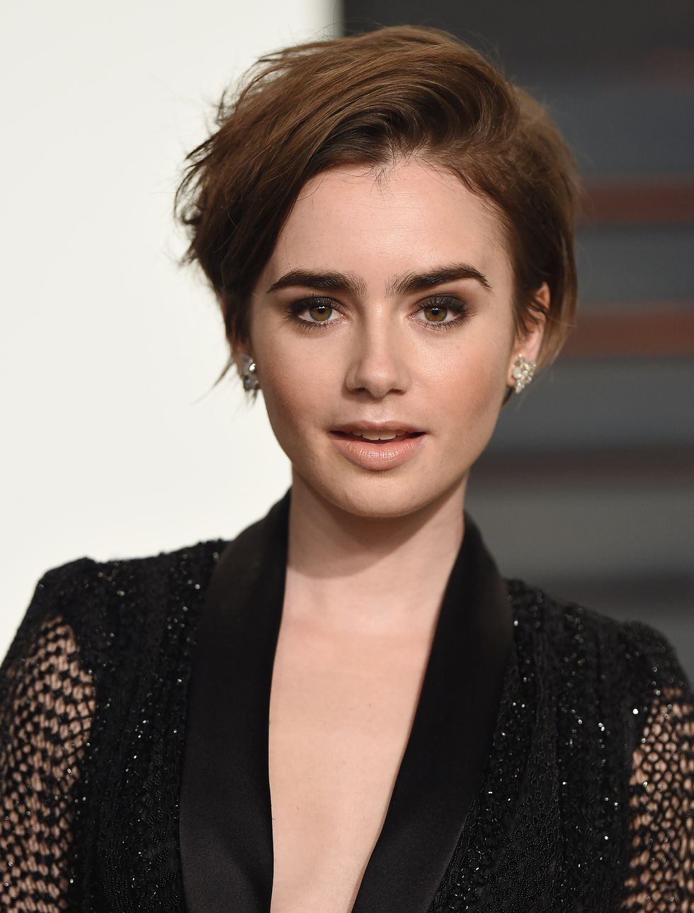 beverly hills, ca february 22 actress lily collins arrives at the 2015 vanity fair oscar party hosted by graydon carter at wallis annenberg center for the performing arts on february 22, 2015 in beverly hills, california photo by axellebauer griffinfilmmagic