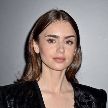 lily collins’ long, choppy, wispy layers are verging on the classic shaggy wolf haircut