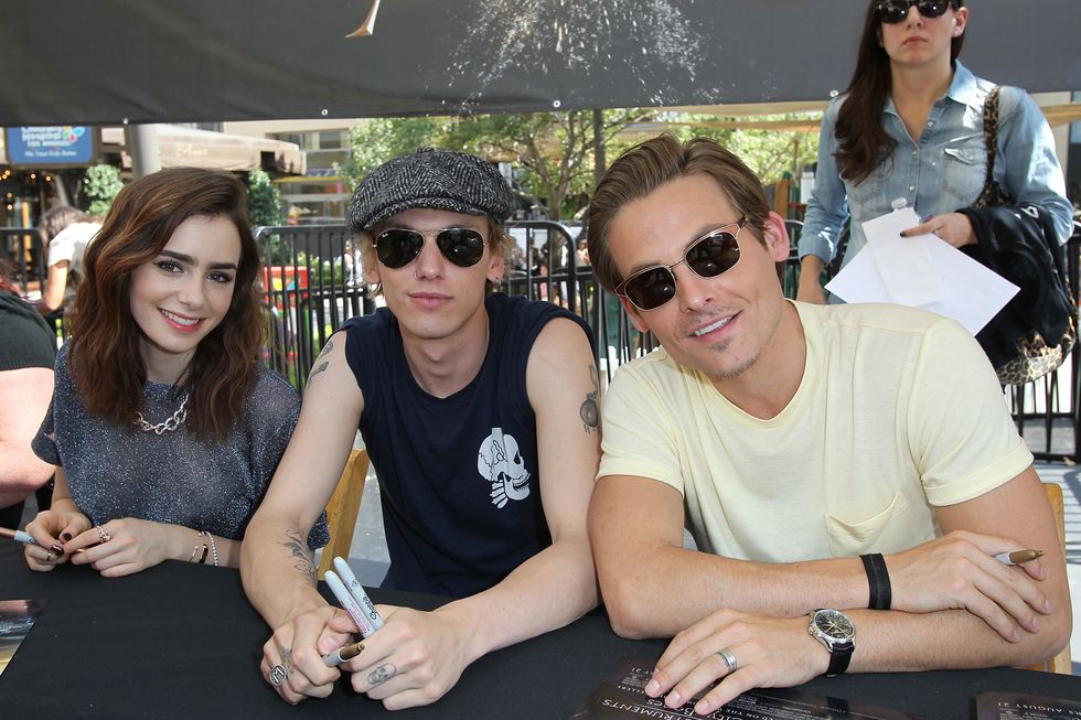 lily collins, jamie campbell bower, cassandra clare and director of "the mortal instruments" at the americana