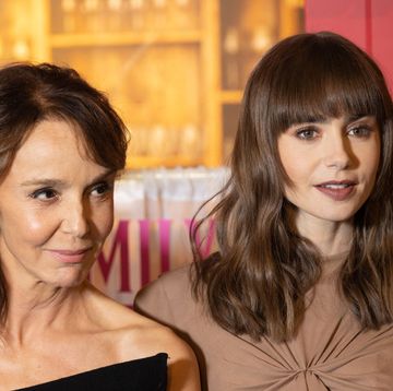 paris, france december 06 l r philippine leroy beaulieu and lily collins attend the emily in paris season 3 world premiere at theatre des champs elysees on december 06, 2022 in paris, france photo by marc piaseckiwireimage