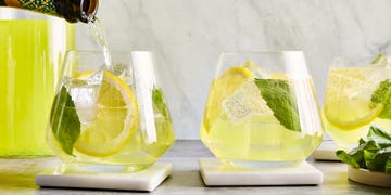 limoncello spritz filled with basil and lemon slices