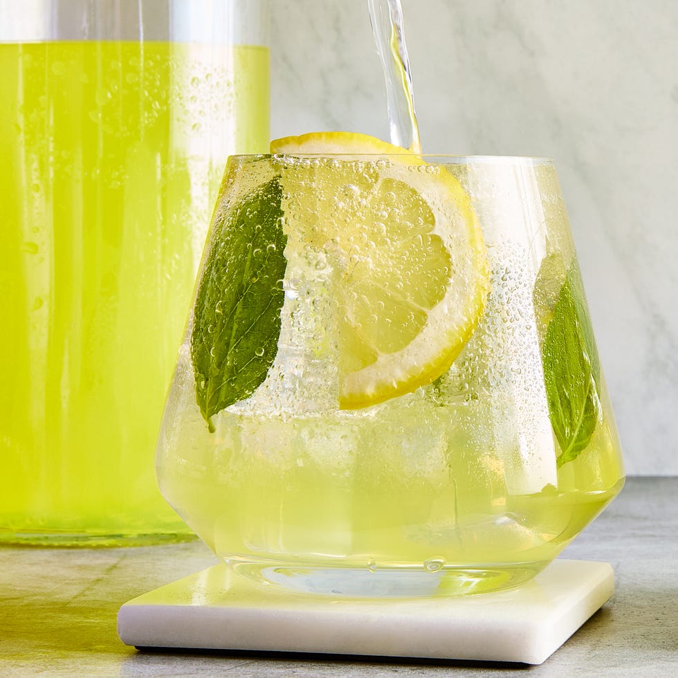 limoncello spritz filled with basil and lemon slices