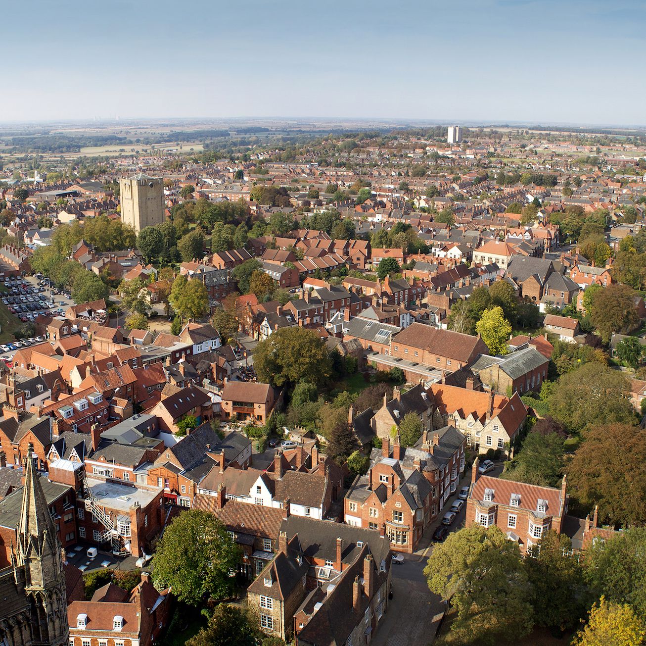 a stunning view of the ancient city of lincoln, england, taken from the cathedral bell tower   272 feet high stitched panoramic image   this image is a composite of smaller sections