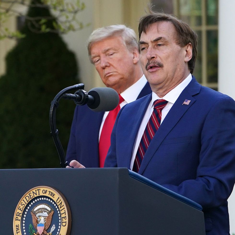 us president donald trump listens as michael j lindell, ceo of mypillow inc, speaks during the daily briefing on the novel coronavirus, covid 19, in the rose garden of the white house in washington, dc, on march 30, 2020 photo by mandel ngan  afp photo by mandel nganafp via getty images
