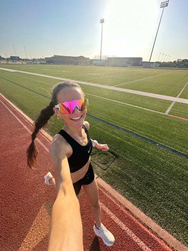 runner in athletic wear on a track field