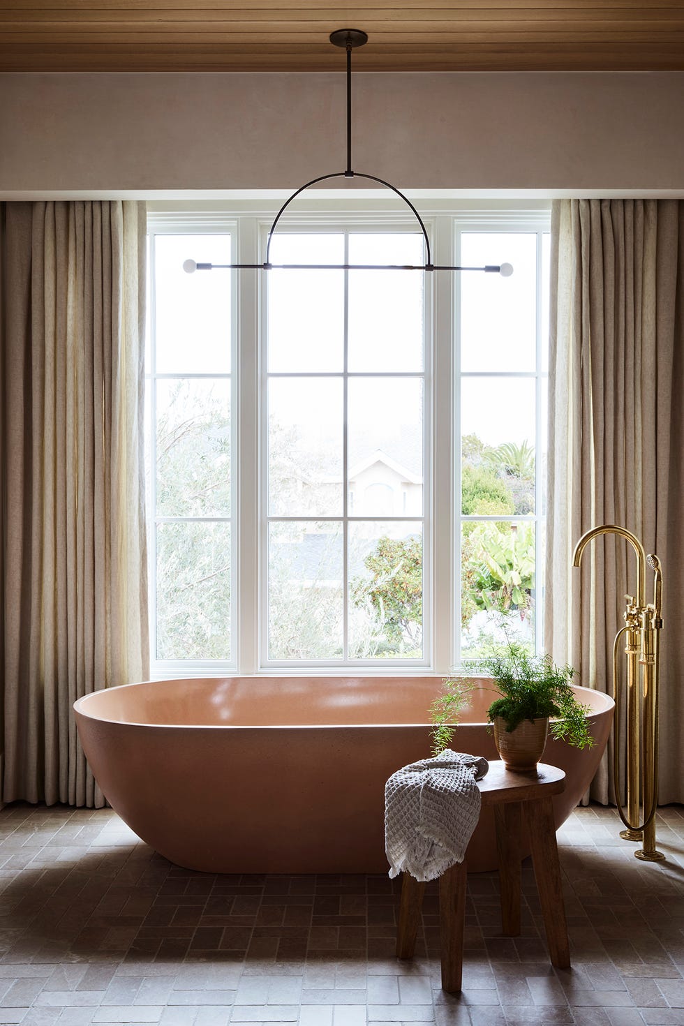 a large bathtub in a bathroom a large bathtub in a bathroom