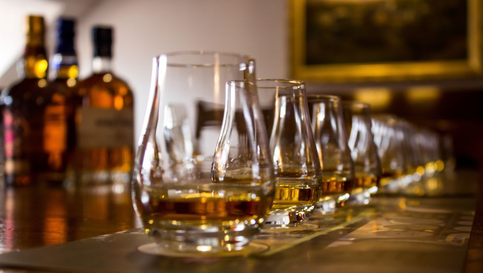 a line of whisky tasting glasses