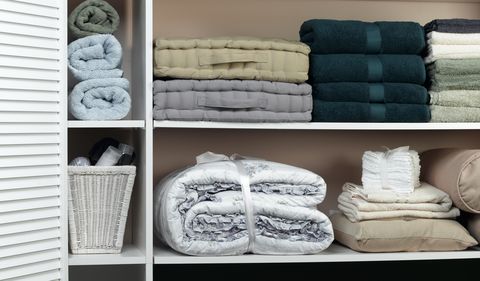 room organization linen closet roll towels