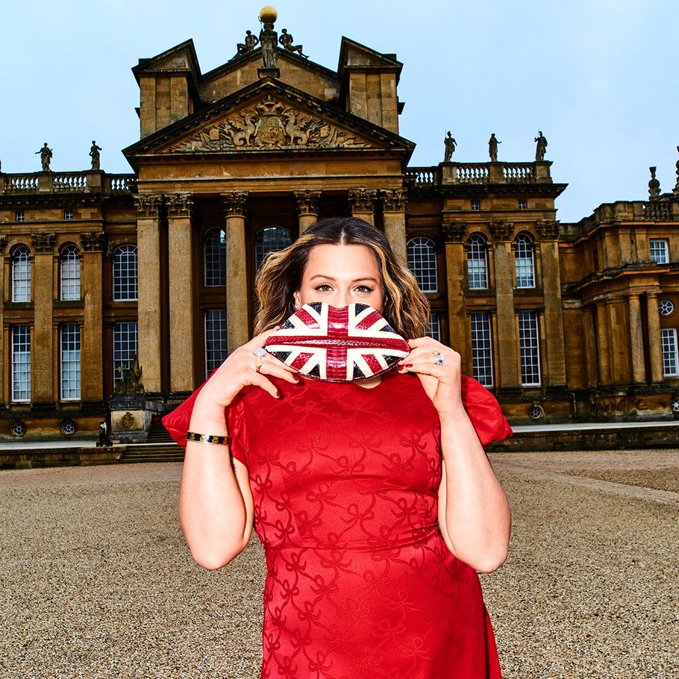 maddy guinness with her mother's famous union jack lips clutch, pictured outside blenheim ﻿