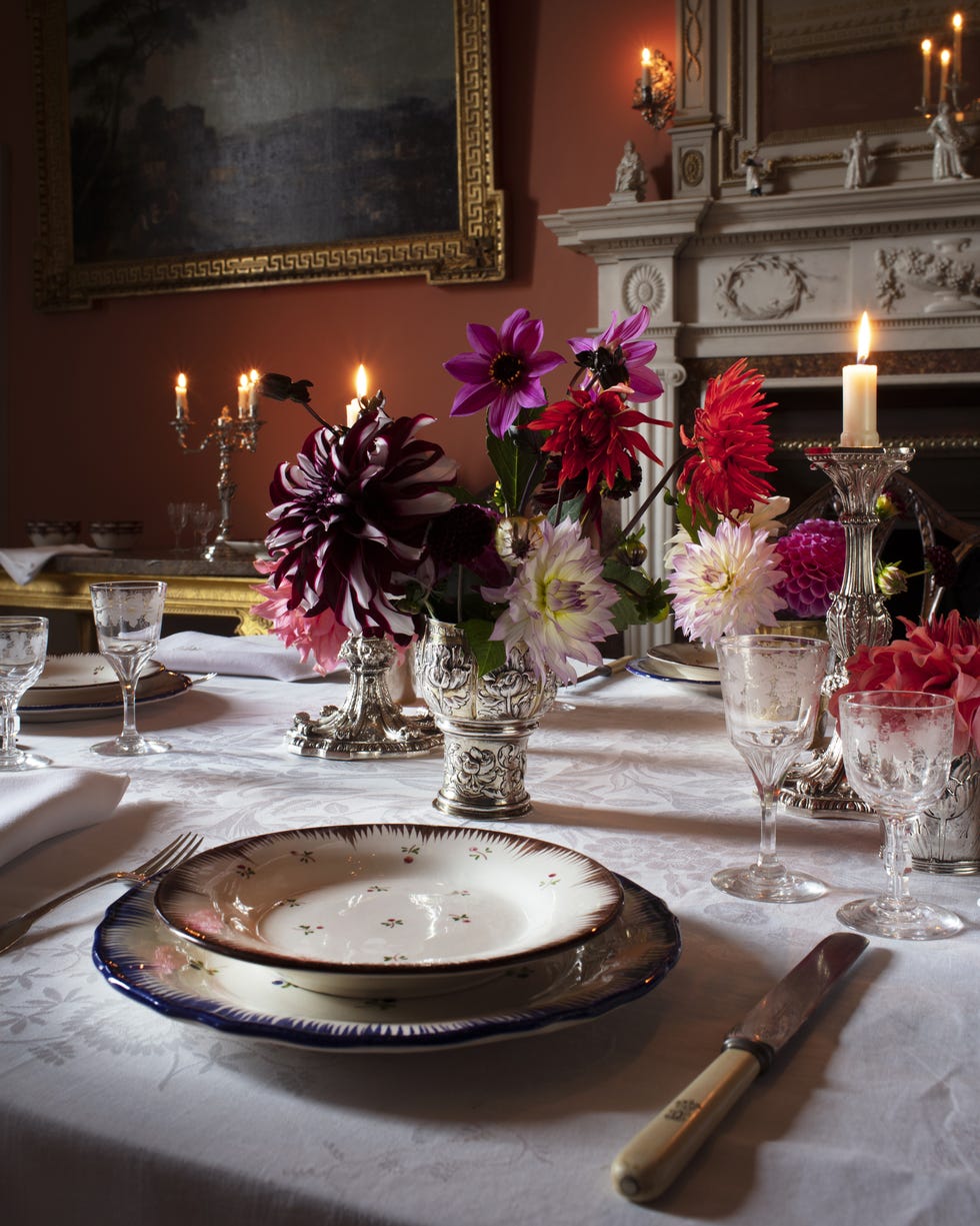 a table with plates and glasses