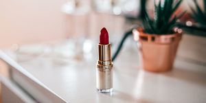 red lipstick on  dressing table