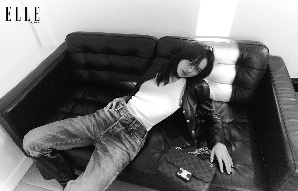 a person lying on a couch