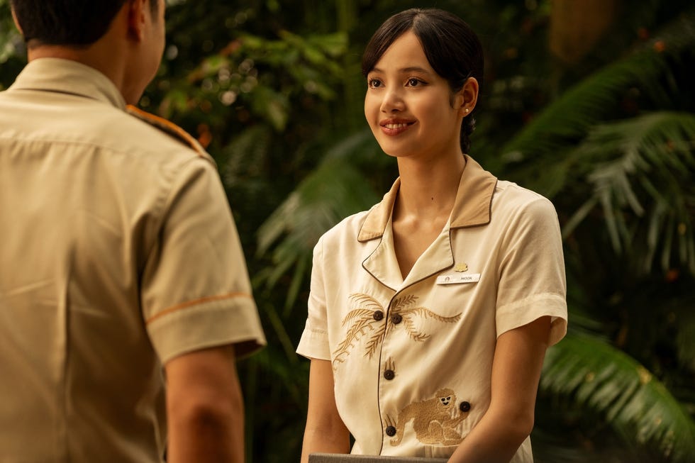 interaction between two individuals in a tropical setting