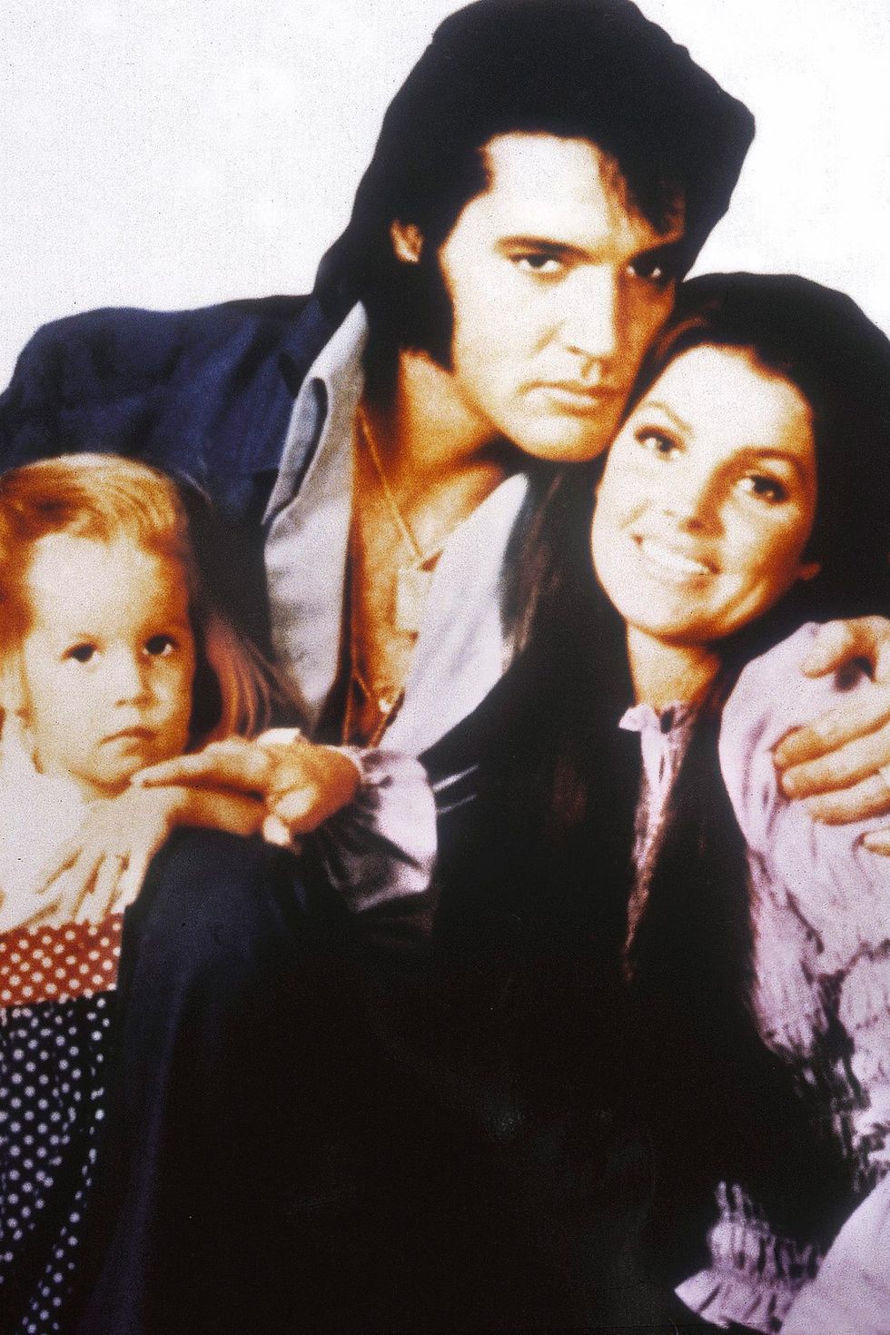Lisa Marie Presley con sus padres, Elvis Presley y Priscilla Presley