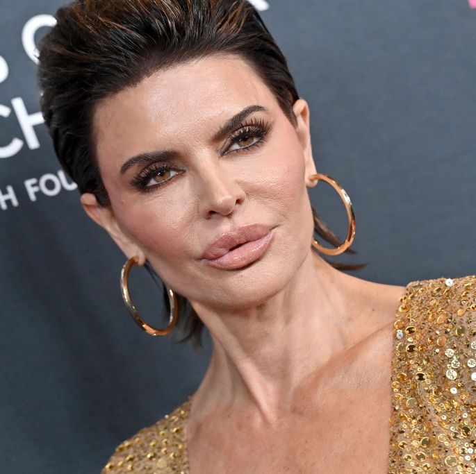 Lisa Rinna Poses Topless With Extra-Long Hair in Nearly Unrecognizable Pic