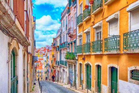 lisbon, portugal street perspective view with colorful traditional houses