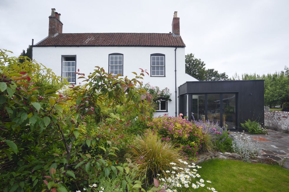 listed period house with modern extension and garden in summer bristol, uk