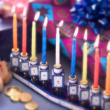 lit menorah and hanukkah presents