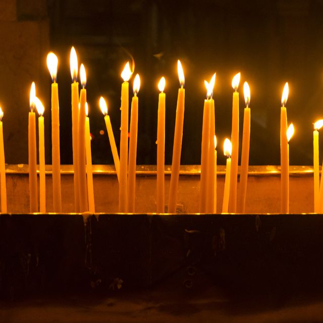 Lite Candles in Church of The Holy Sepulchre.