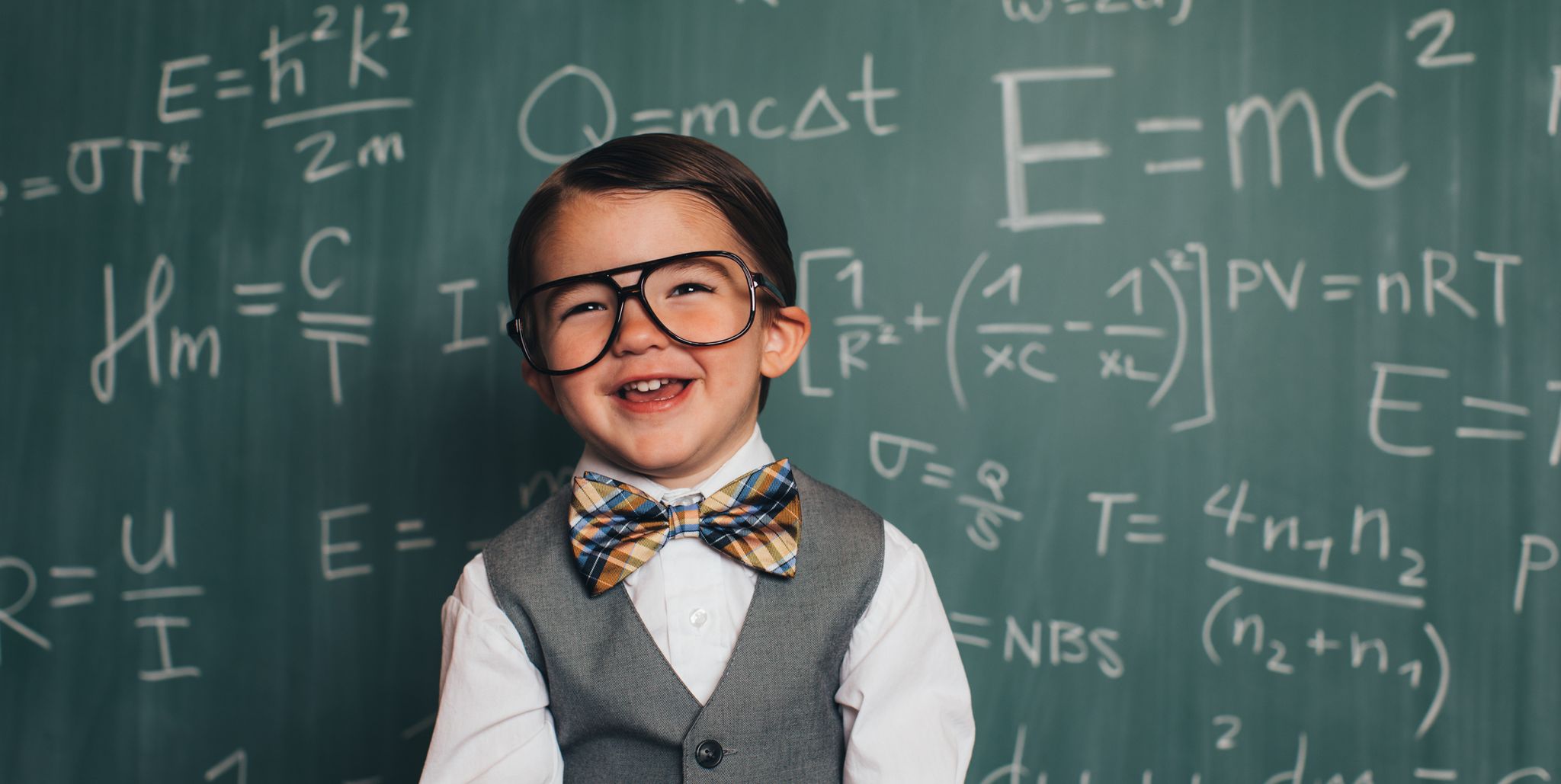 little boy - maths blackboard