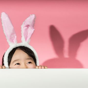 little girl with rabbit ears headband
