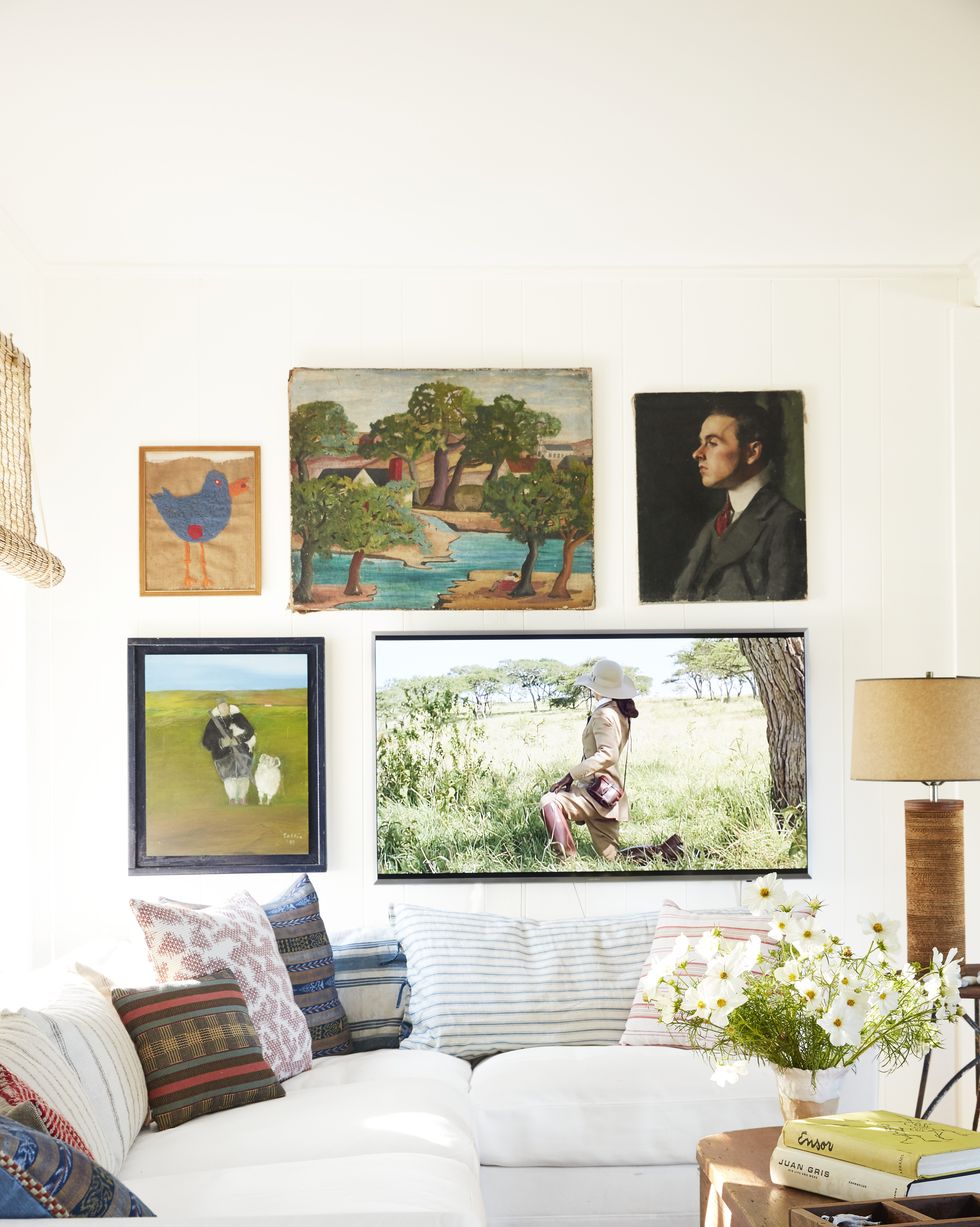 living room with gallery wall with television