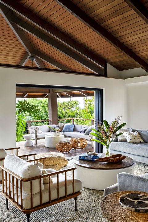 vacation home in maui, hawaii designed by breeze giannasio interiors sofas, custom, fabricated by the tac room chair and coffee table, sonder living jute cushions, cb2 rug, armadillo