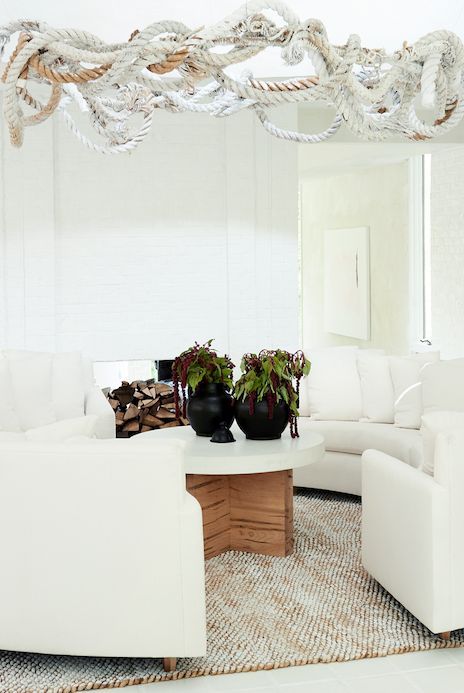 white living room with diy rope pendant