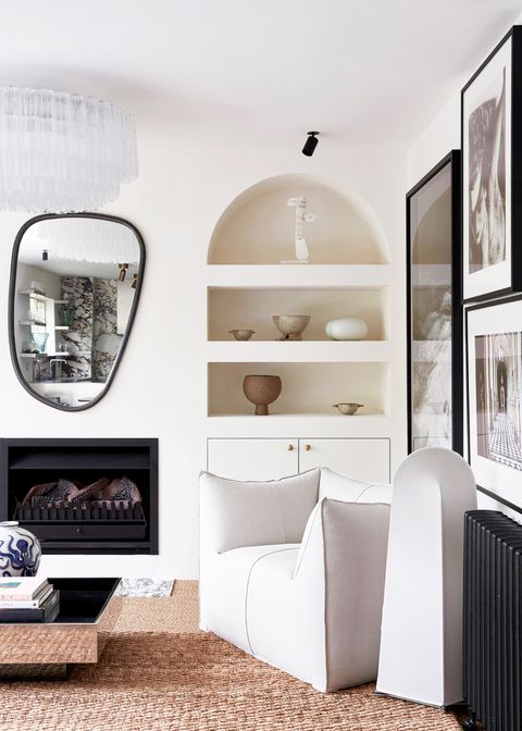 modern minimalist living room with avant garde mirror