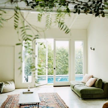 living room overlooking backyard pool