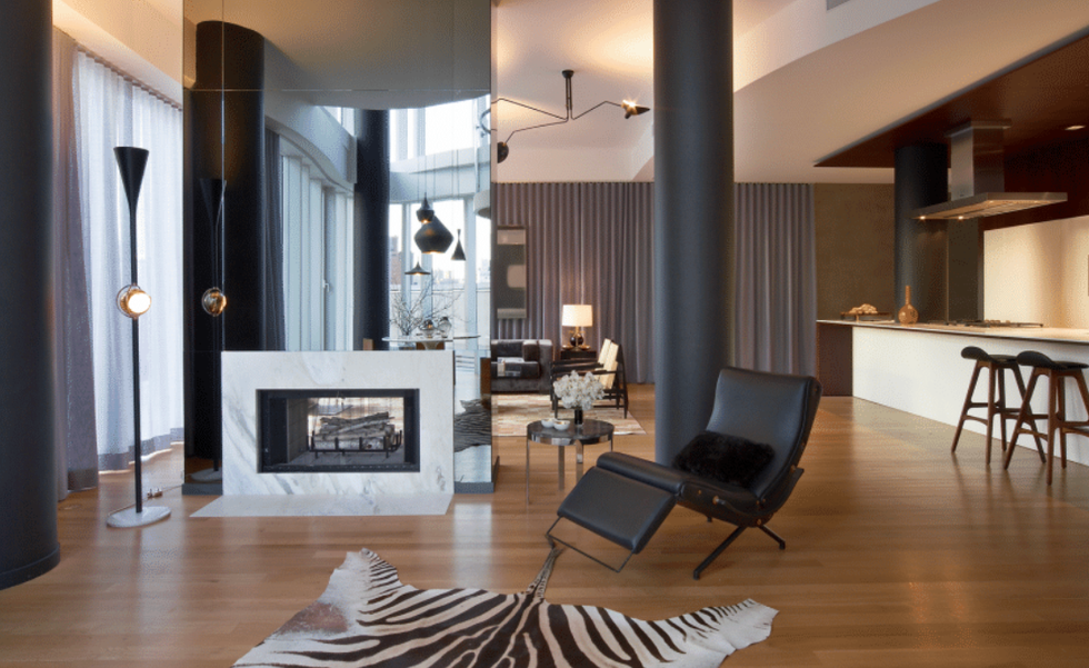 a living room with a fireplace a living room with a fireplace