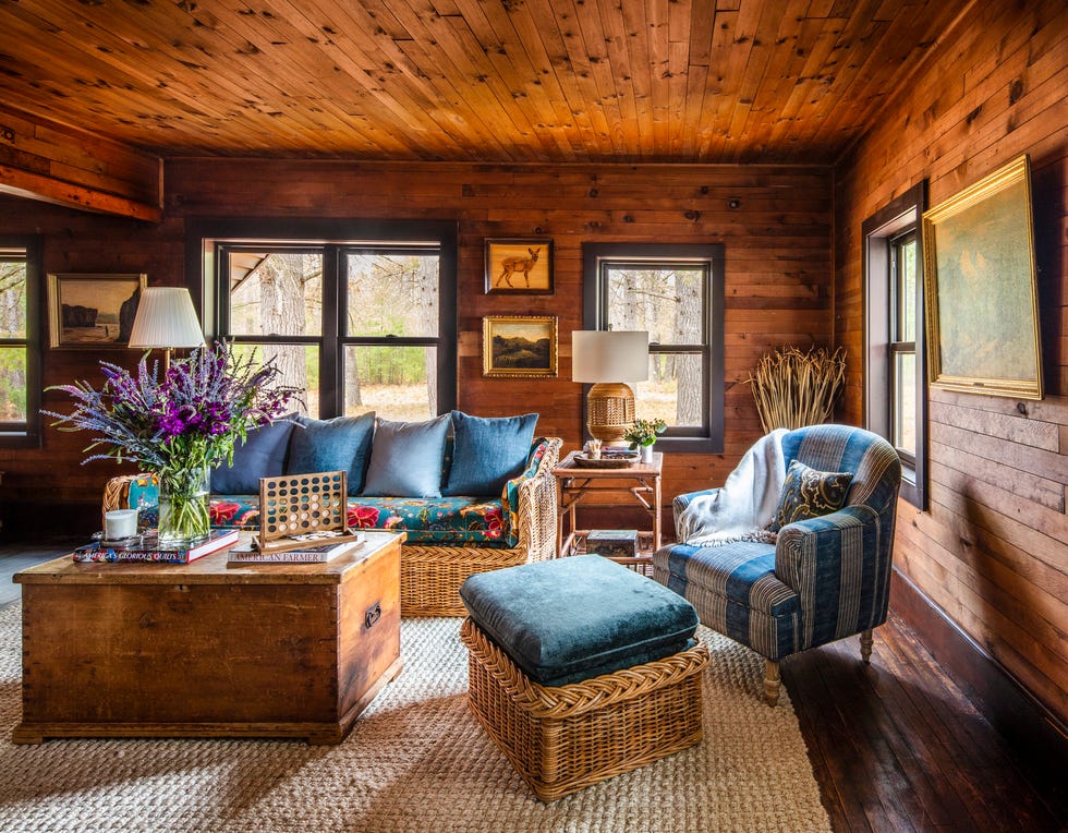 wood wrapped living room with blue upholstery