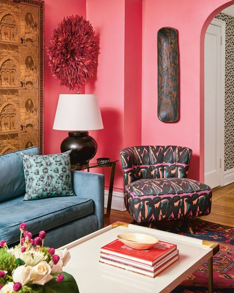 Living room, Furniture, Room, Couch, Interior design, Red, Pink, Wall, Orange, Table, 