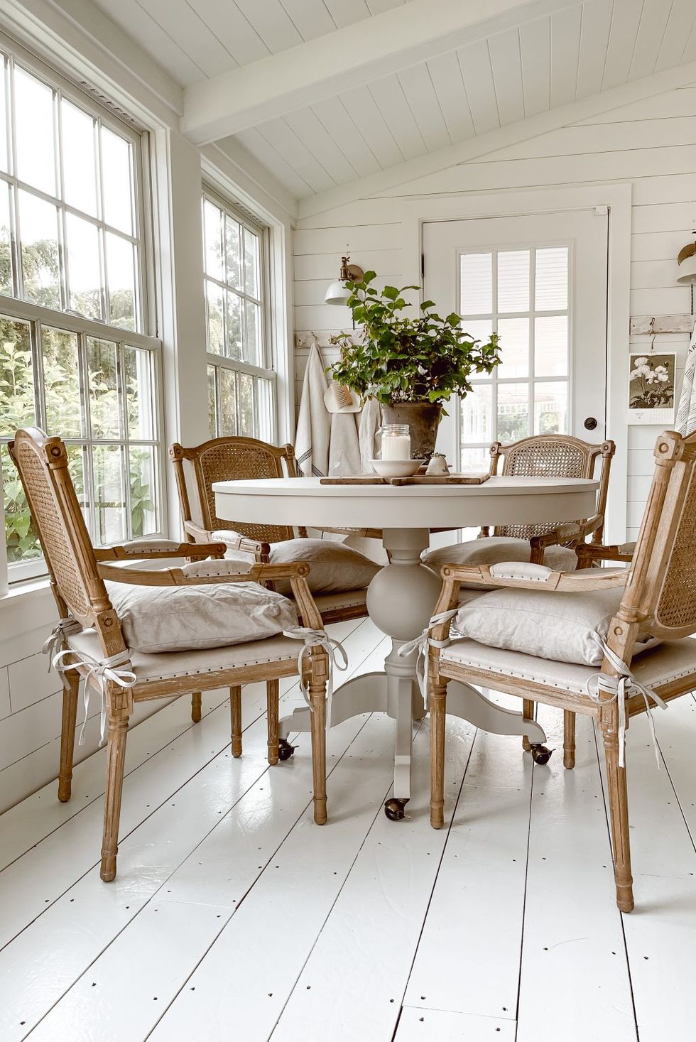 sunroom ideas with a white wooden floor