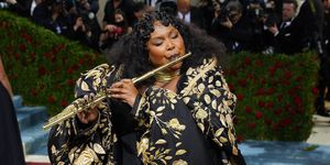 new york, new york   may 02 lizzo plays the flute at the 2022 costume institute benefit celebrating in america an anthology of fashion at metropolitan museum of art on may 02, 2022 in new york city photo by sean zannipatrick mcmullan via getty images