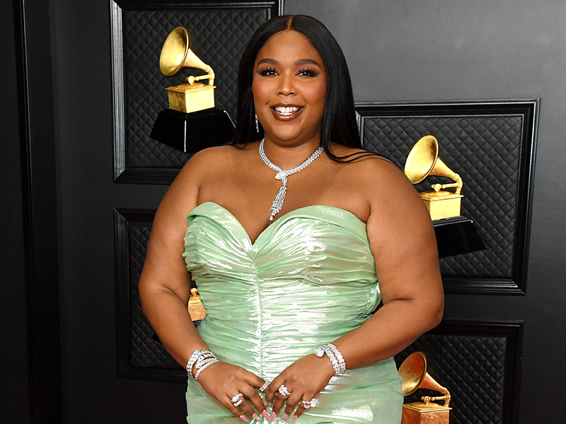 Lizzo posts video wearing white wedding dress on holiday
